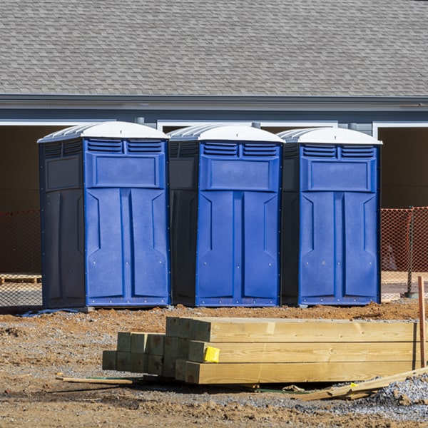 what is the cost difference between standard and deluxe porta potty rentals in Lambert MT